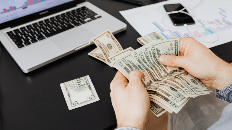 a person counting a money
