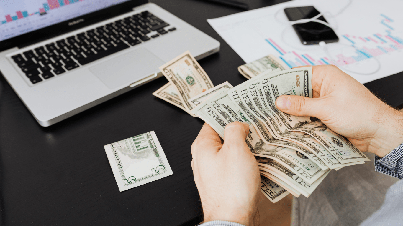 a person counting a money